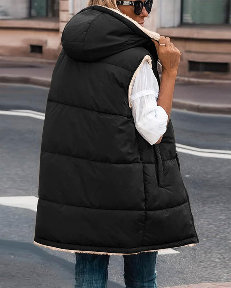 Vändbar termoväst med huva