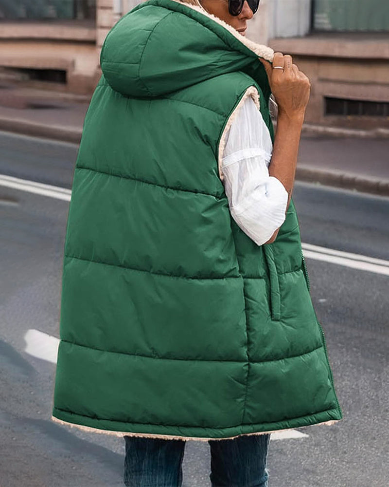 Vändbar termoväst med huva