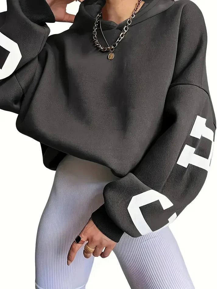 Oversized tröja med långa ärmar och textlogotyp på ärmen