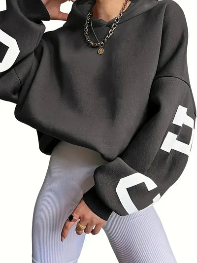Oversized tröja med långa ärmar och textlogotyp på ärmen