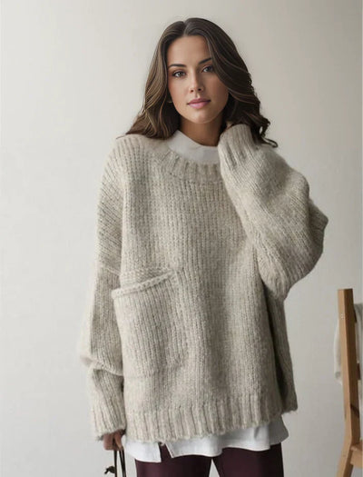 Oversized jumper med elfenbensfärgad framficka och stora, djupa fickor för kvinnor