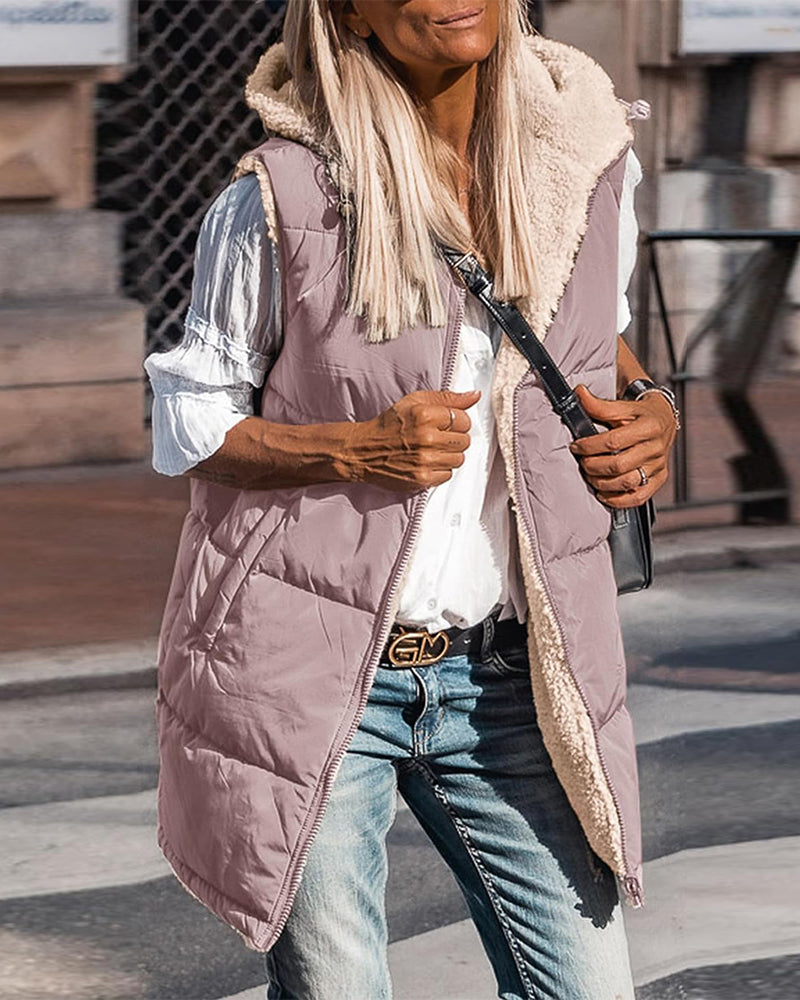 Vändbar termoväst med huva