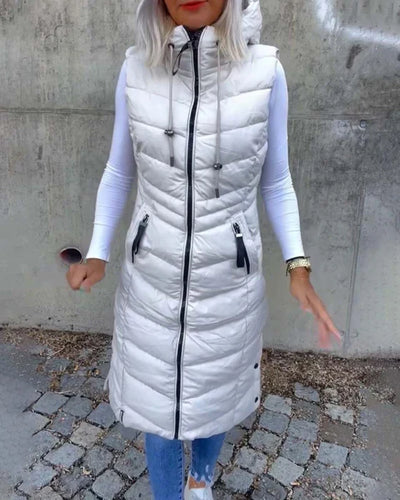 Ärmlös, ledig quiltad jacka med huva och dragkedja
