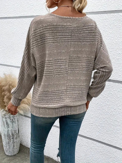 Blöt | Enfärgad tröja med vida ärmar för kvinnor