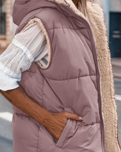 Vändbar termoväst med huva