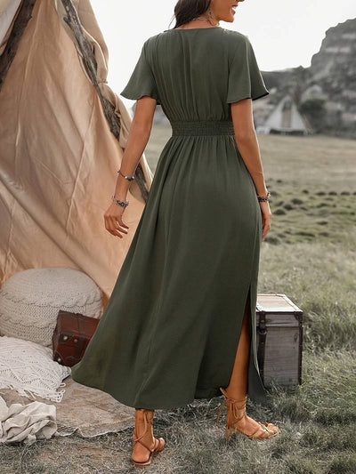 Lucy – elegant kortärmad klänning med korkrage