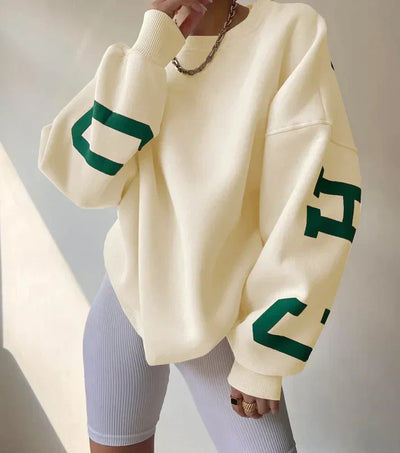 Oversized, trendig jumper med bokstäver på ärmarna för kvinnor