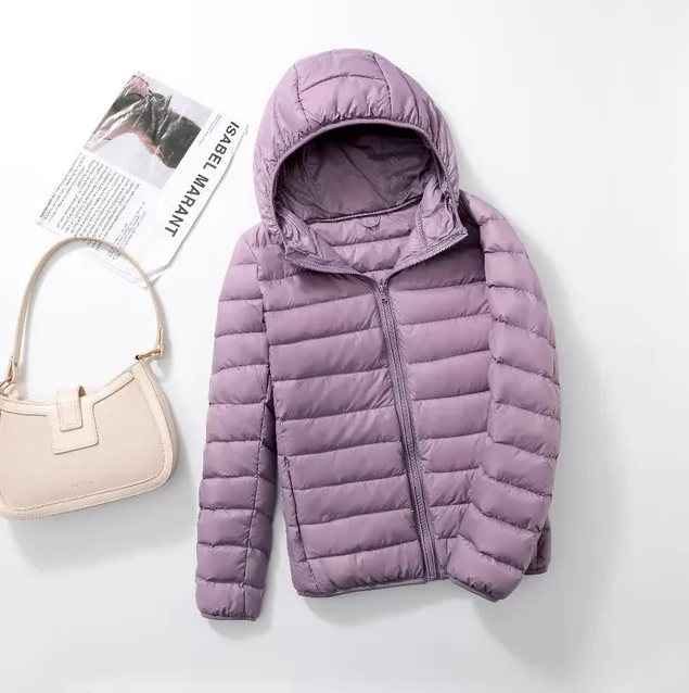 De nya ultralätta, packbara dunjackorna med huva