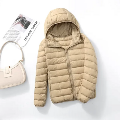 De nya ultralätta, packbara dunjackorna med huva