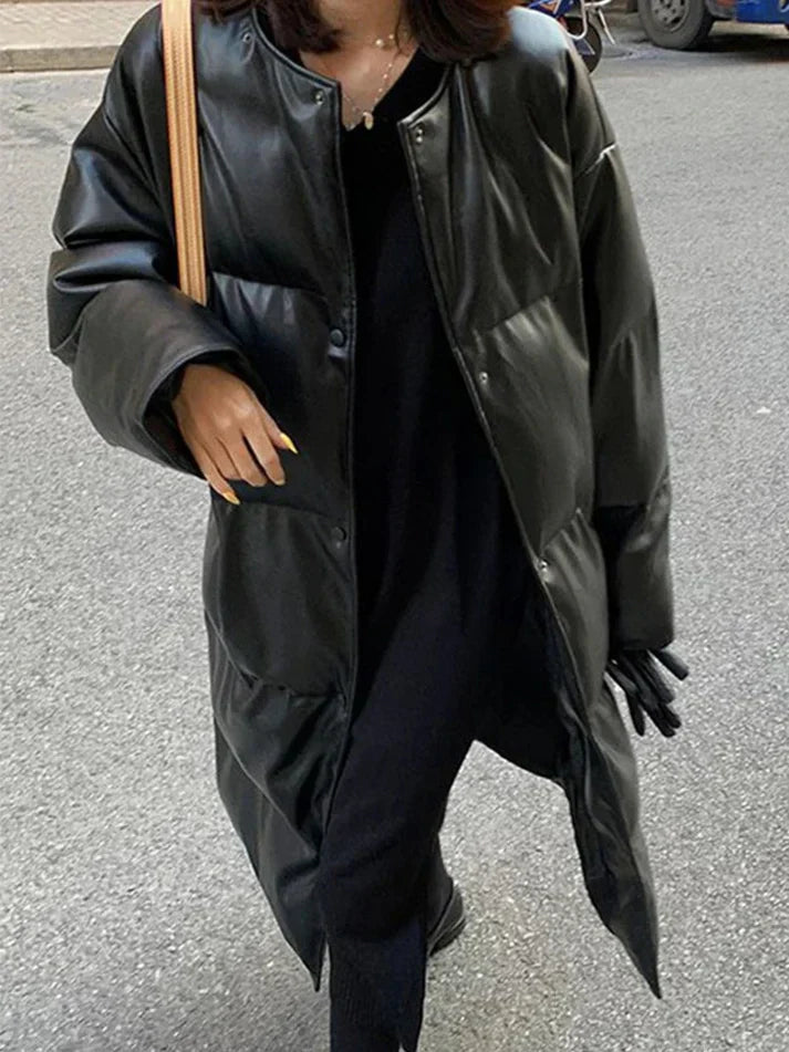 Aimee lång pufferjacka i skinn med skärp