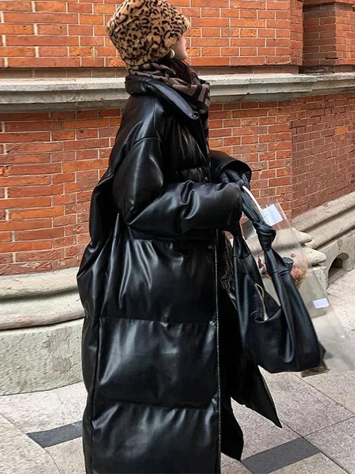 Aimee lång pufferjacka i skinn med skärp