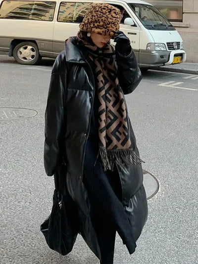 Aimee lång pufferjacka i skinn med skärp