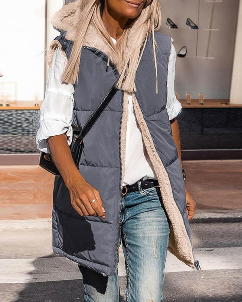 Vändbar termoväst med huva