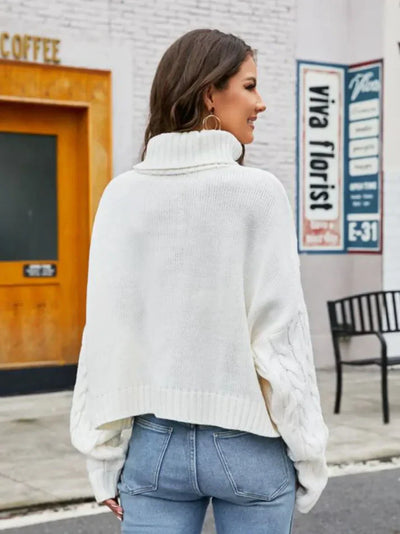 Damtröja med turtleneck i tjockt stickat - vintermode 2024