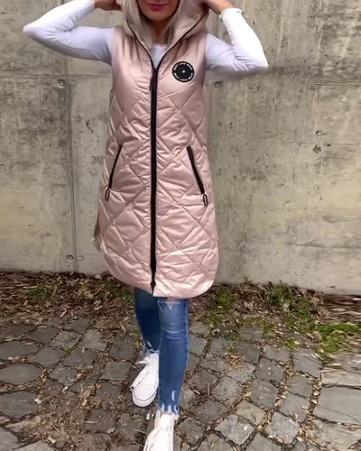 Ärmlös – ledig quiltad jacka med huva och dragkedja
