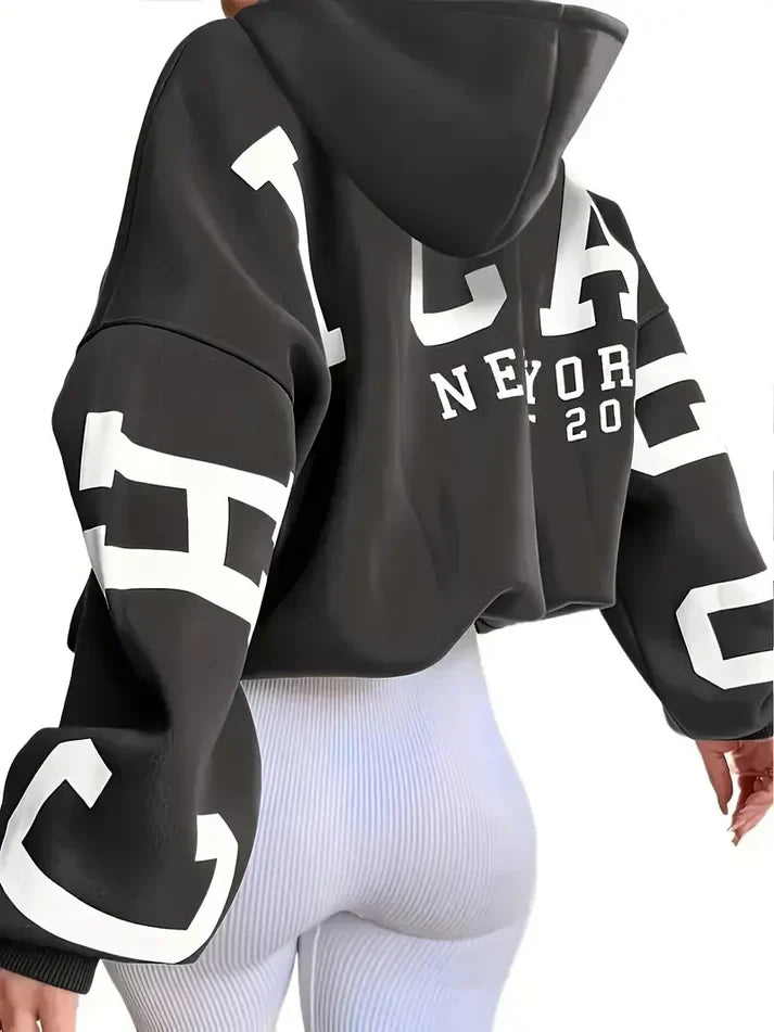 Oversized tröja med långa ärmar och textlogotyp på ärmen