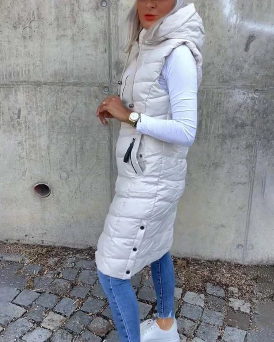 Ärmlös, ledig quiltad jacka med huva och dragkedja