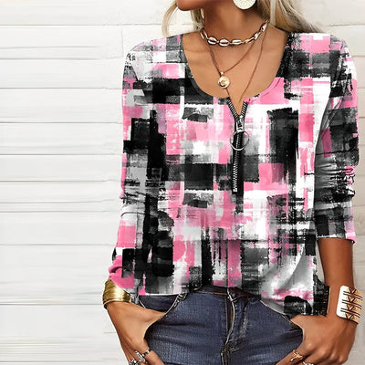 Eva janssen – rosa blus med modernt tryck