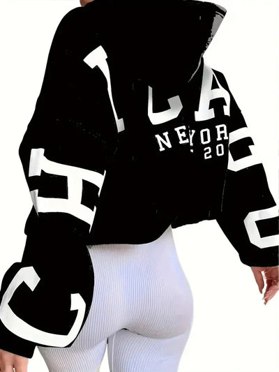 Oversized tröja med långa ärmar och textlogotyp på ärmen