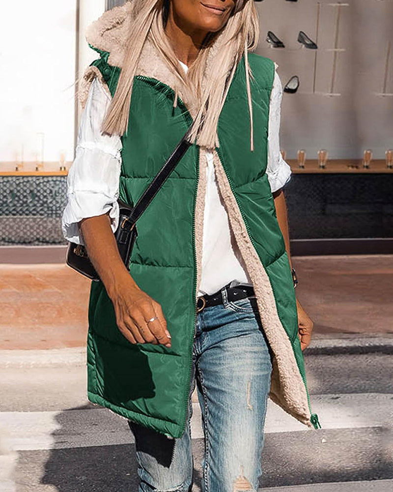 Vändbar termoväst med huva