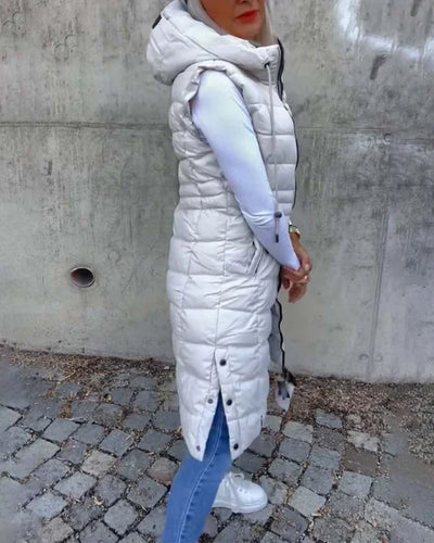 Ärmlös, ledig quiltad jacka med huva och dragkedja